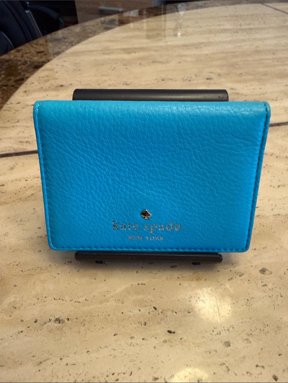 kate spade bright turquoise leather card case with gold logo
